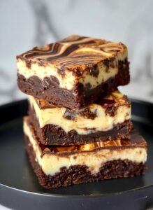 Keto Brownie Cheesecake with creamy cheesecake layer